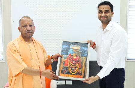 The District Magistrate presented a picture of Mother Shitala to the Chief Minister and apprised him of the progress of development works