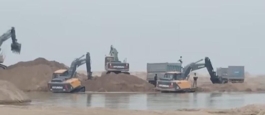 The roaring excavators amidst the flowing stream have raised serious questions.