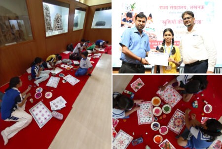 Children spread colors in the 'School of Happiness'; block printing activity enhances children's creative skills.
