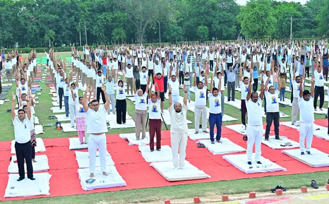 An ocean of yoga enthusiasts surges in Aligarh, embodying the spirit of ‘Yogah Karmasu Kaushalam’ (Yoga is excellence in action).