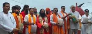 Ritual bathing of the deity at Lakshman Tila with Ganga water from Bithoor; organization remains steadfast despite police restrictions.